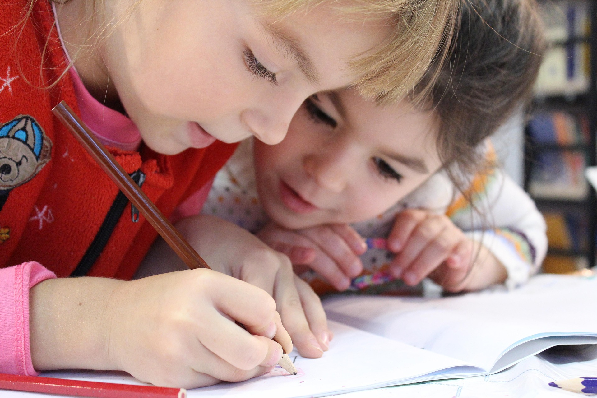 Children writing and learning together